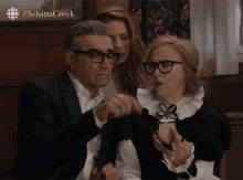 Which Way Do You Swipe To Get Rid Of This One Eugene Levy GIF - Which Way Do You Swipe To Get Rid Of This One Eugene Levy Catherine Ohara GIFs