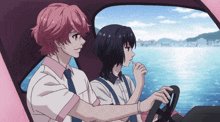 a boy and a girl are sitting in a car looking out the window