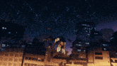 a robot is sitting on top of a building in a city at night