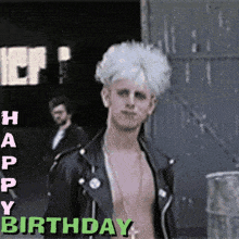 a man in a leather jacket is standing in front of a building with the words happy birthday written above him