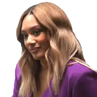 a woman with long blonde hair is wearing a purple blazer