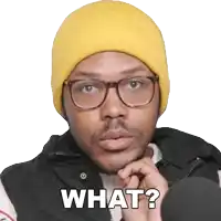 a man wearing glasses and a yellow beanie is asking what