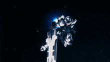 a blue and white robot with the letter f on it