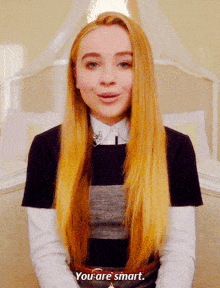 a woman with long blonde hair says you are smart