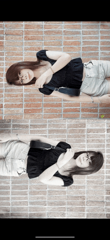 two women standing in front of a brick wall one in a black top and the other in white shorts