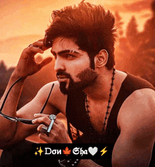 a man with a beard is wearing sunglasses and a necklace with the word don on it