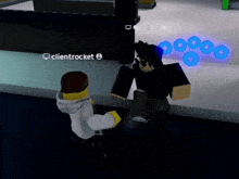 a man is holding a gun in a video game while a woman kicks him in the face .