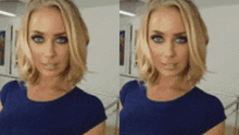 a blonde woman in a blue shirt is smiling and looking at the camera