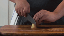 Chopping Ginger Two Plaid Aprons GIF