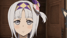 a girl with white hair and a purple and yellow headband