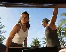 a man and a woman standing next to each other