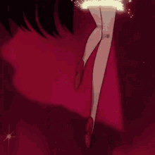 a girl in a sailor suit is holding a glowing object in her hands .