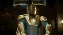 a knight in armor with a hammer on his head .