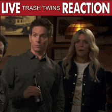 a man and a woman are standing in front of a sign that says " live trash twins reaction "