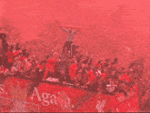 a large crowd of people are gathered around a banner that says again