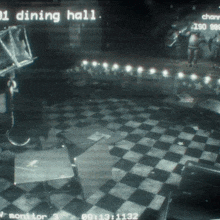 a black and white video of a dining hall