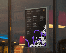 a poster hanging in a window that says " расписание занятий " on it