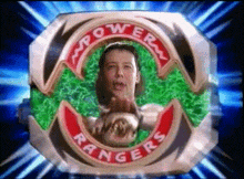 a power rangers logo with a woman in the center