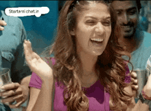 a woman is laughing with a speech bubble that says startamichat.in above her