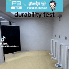 a wendy 's first kitchen durability test is being performed in a public restroom