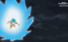 a cartoon character is flying through the air with a blue energy coming out of his mouth .