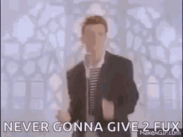 Rick Astley Never Gonna Give You Up GIF - Rick Astley Never Gonna Give You Up Music Video GIFs