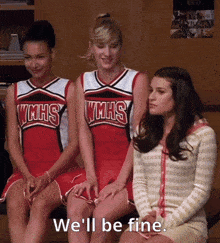 three cheerleaders from wmhs are sitting next to each other and one of them says we 'll be fine