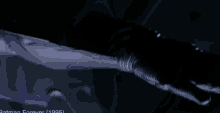 a close up of a batman symbol on a black background