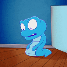 a blue cartoon character is sitting on the floor in front of a door