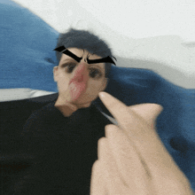 a blurry photo of a person with a cartoon face on their face