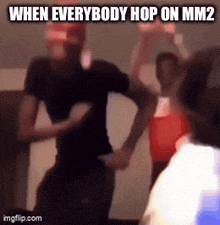 a group of people are dancing in a room with the caption when everybody hop on mm2 .