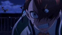 a close up of a person 's face with a very angry expression