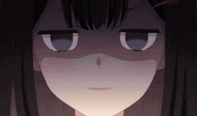 a close up of a girl 's face with a very angry expression