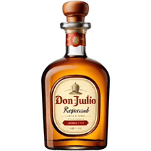 a bottle of don julio reposado with a wooden stopper