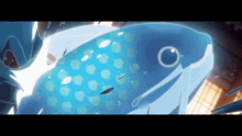 a cartoon drawing of a blue fish with a circle around its eye
