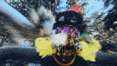 a man wearing a skull mask and goggles holds a smoke bomb in front of his face