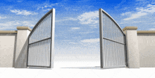 a white fence with a gate open to a blue sky