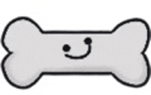 a dog bone with a smiling face on it .