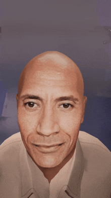 a close up of a bald man 's face with a smile on his face