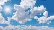 a blue sky with white clouds and the sun shining through the clouds