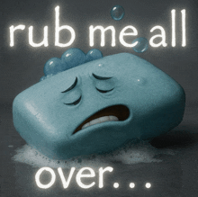 a blue soap bar with a sad face and the words rub me all over above it