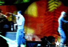 a blurry picture of a band with a star in the corner