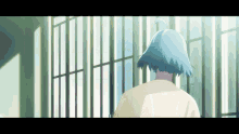 a girl with blue hair is standing in a prison cell
