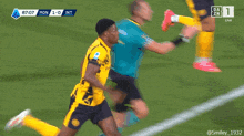a soccer player wearing a yellow jersey that says betsson