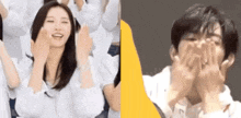 a man and a woman are sitting next to each other with their hands in front of their faces .