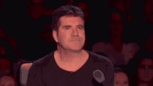 simon cowell laser eyes morphs into simon cowell itsano from me itsa no fromme