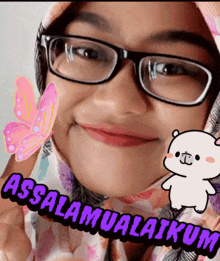 a girl wearing glasses and a scarf with the words assalamualaikum on it