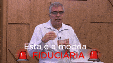 a man is holding a stack of money in front of a sign that says esta e a moeda fiduciaria