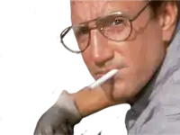 a man with glasses is smoking a cigarette