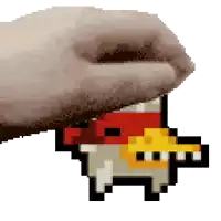 a pixel art of a hand holding a red and yellow item